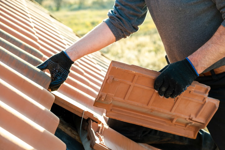 Worker Installing new Roof in Gresham, OR